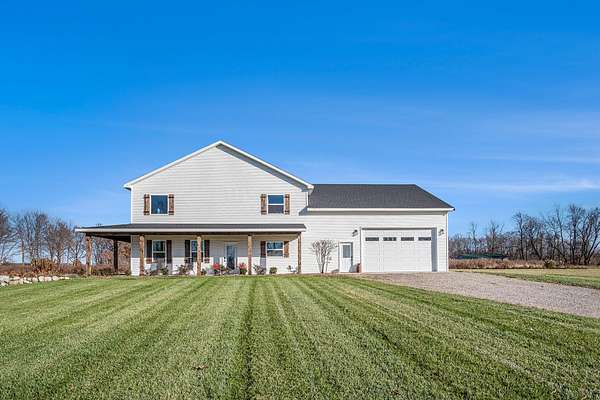 3 Acres of Residential Land with Home for Sale in Alto, Michigan