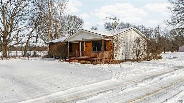 2.49 Acres of Residential Land with Home for Sale in Fowlerville, Michigan