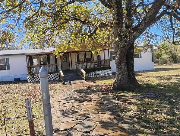 5 Acres of Residential Land with Home for Sale in Stigler, Oklahoma