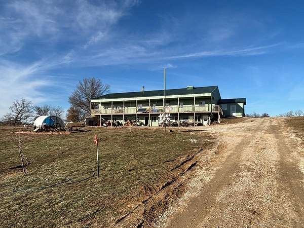 20 Acres of Land with Home for Sale in Brookfield Township, Missouri