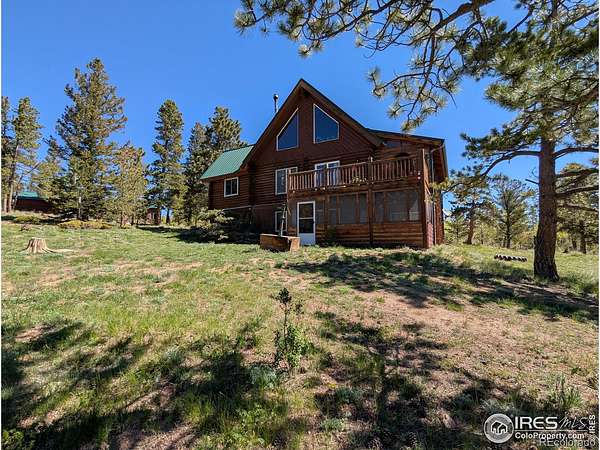 2.59 Acres of Land with Home for Sale in Red Feather Lakes, Colorado