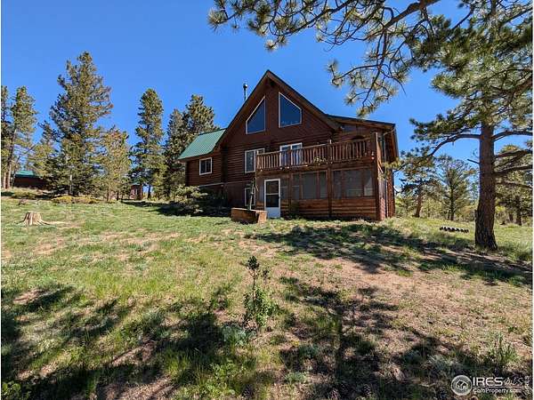 2.59 Acres of Land with Home for Sale in Red Feather Lakes, Colorado