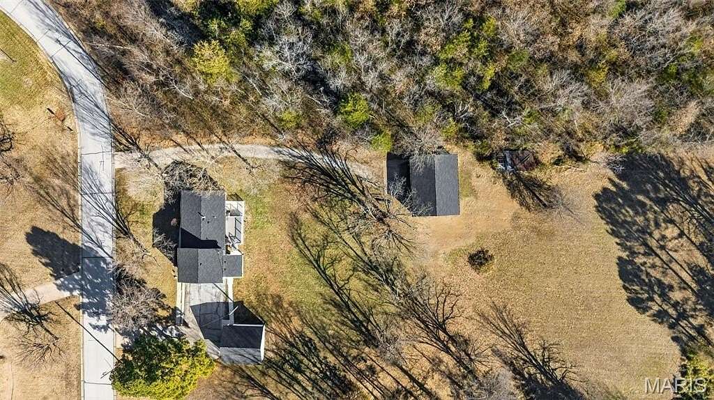 2.45 Acres of Residential Land with Home for Sale in O'Fallon, Missouri