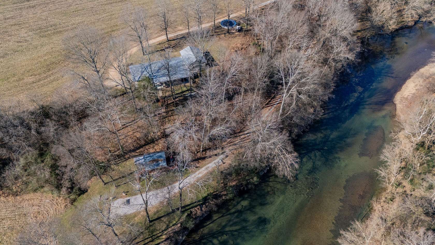 6.7 Acres of Residential Land with Home for Sale in Iron City, Tennessee