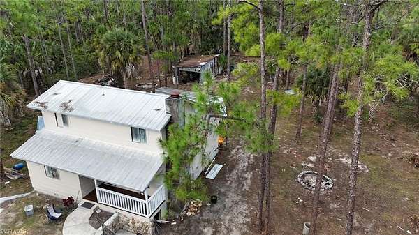 2.27 Acres of Residential Land with Home for Sale in Naples, Florida