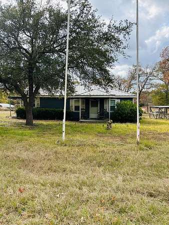 7.8 Acres of Residential Land with Home for Sale in Elkhart, Texas