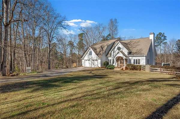 5 Acres of Residential Land with Home for Sale in Canton, Georgia