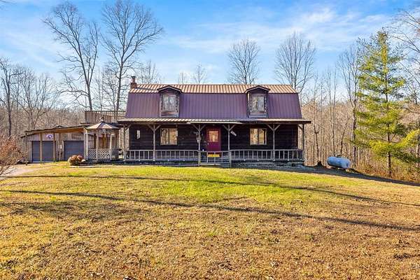 16.3 Acres of Recreational Land with Home for Sale in Roundhill, Kentucky