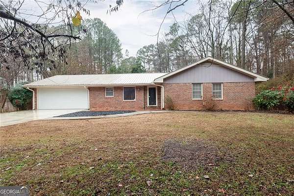 0.74 Acres of Residential Land with Home for Sale in Alpharetta, Georgia