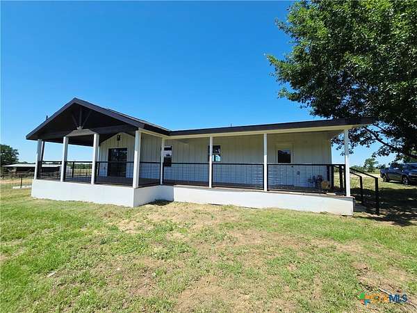 9.45 Acres of Residential Land with Home for Sale in Rockdale, Texas