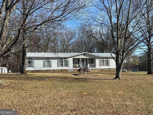 7 Acres of Residential Land with Home for Sale in Roopville, Georgia