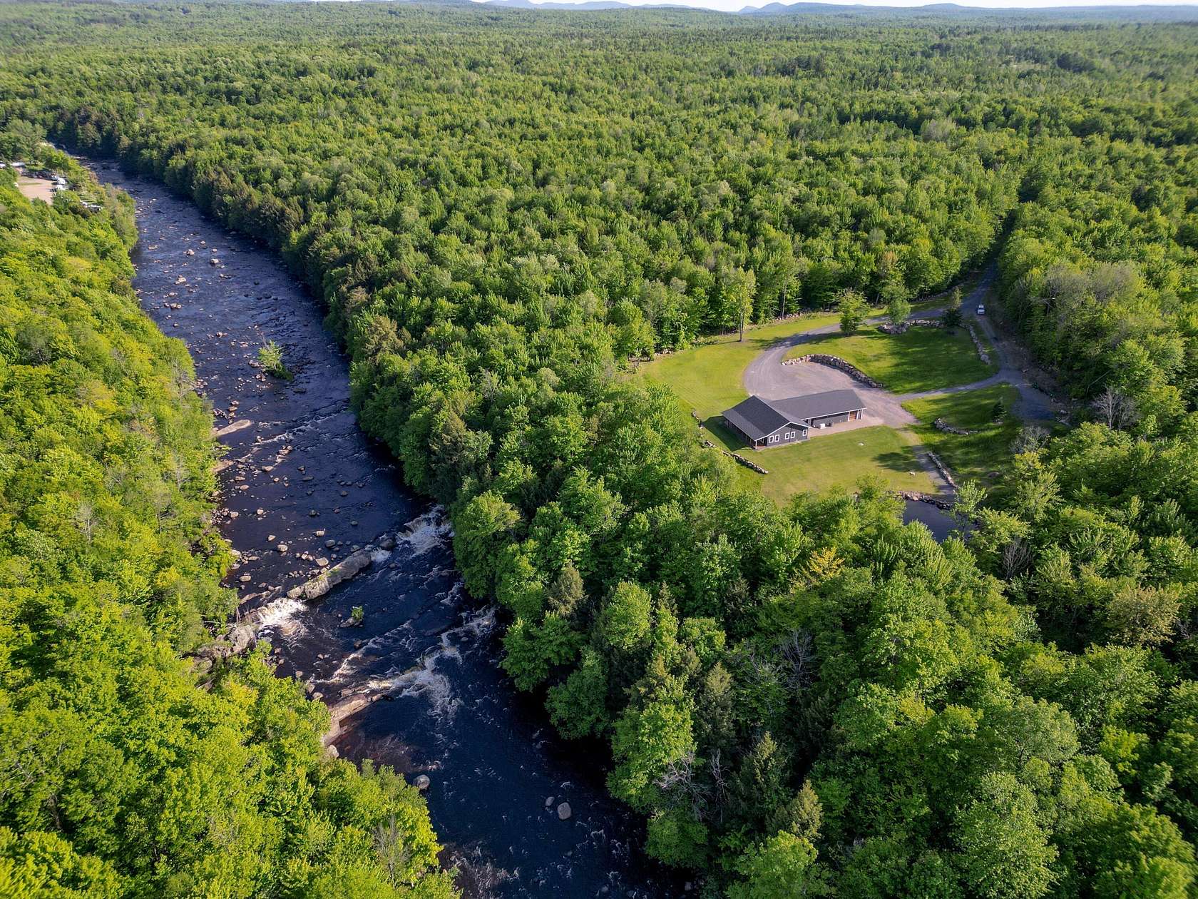 21.3 Acres of Recreational Land with Home for Sale in St. Regis Falls, New York
