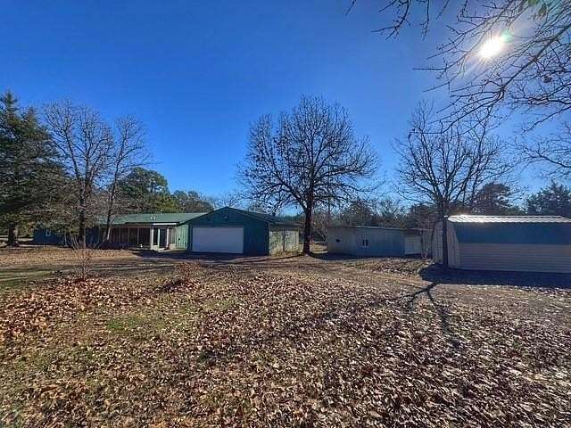 5.29 Acres of Residential Land with Home for Sale in Booneville, Arkansas
