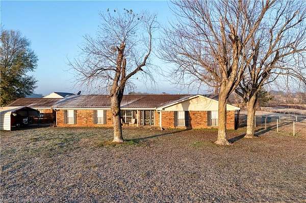 20 Acres of Agricultural Land with Home for Sale in Muldrow, Oklahoma