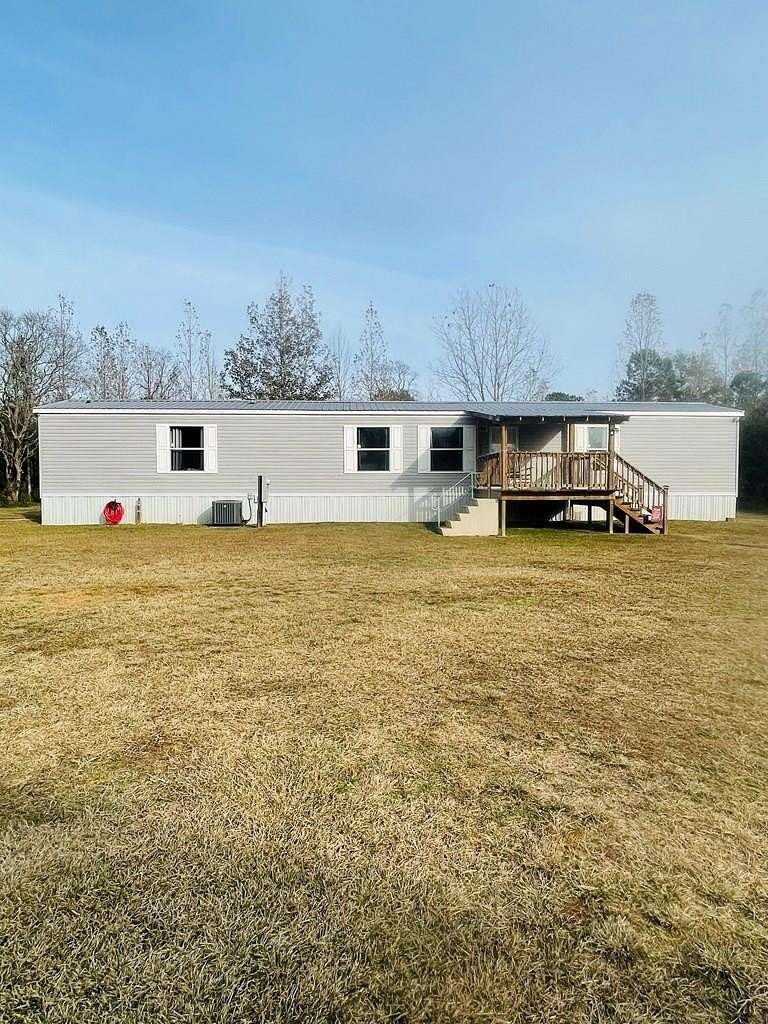 9.73 Acres of Land with Home for Sale in Carriere, Mississippi