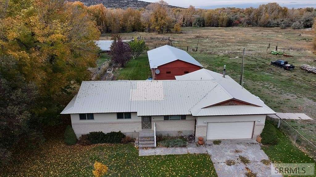 7.9 Acres of Residential Land with Home for Sale in Rigby, Idaho