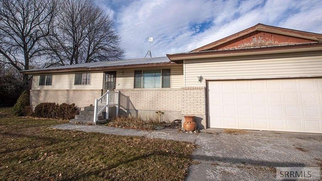 7.9 Acres of Land with Home for Sale in Rigby, Idaho