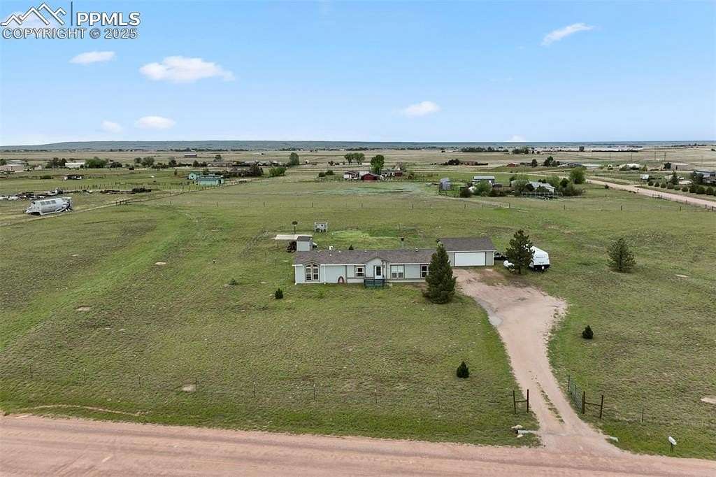 5 Acres of Residential Land with Home for Sale in Peyton, Colorado