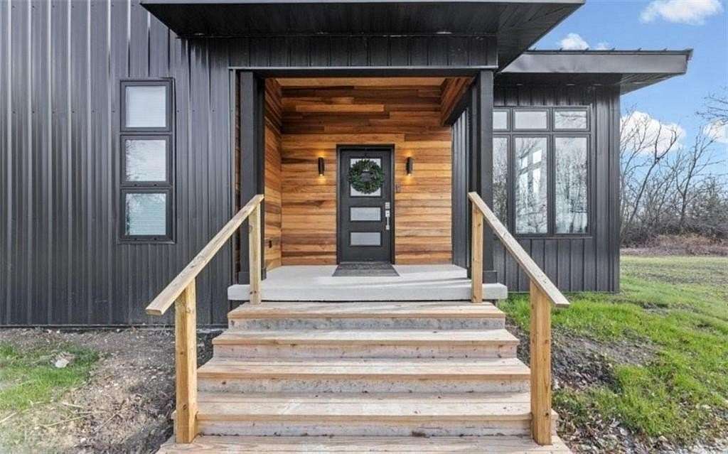 9.6 Acres of Residential Land with Home for Sale in Iola, Kansas