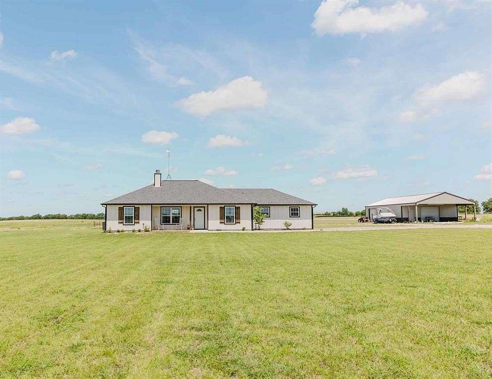 7 Acres of Residential Land with Home for Sale in Decatur, Texas