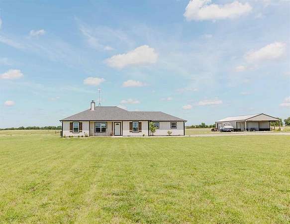 7 Acres of Residential Land with Home for Sale in Decatur, Texas