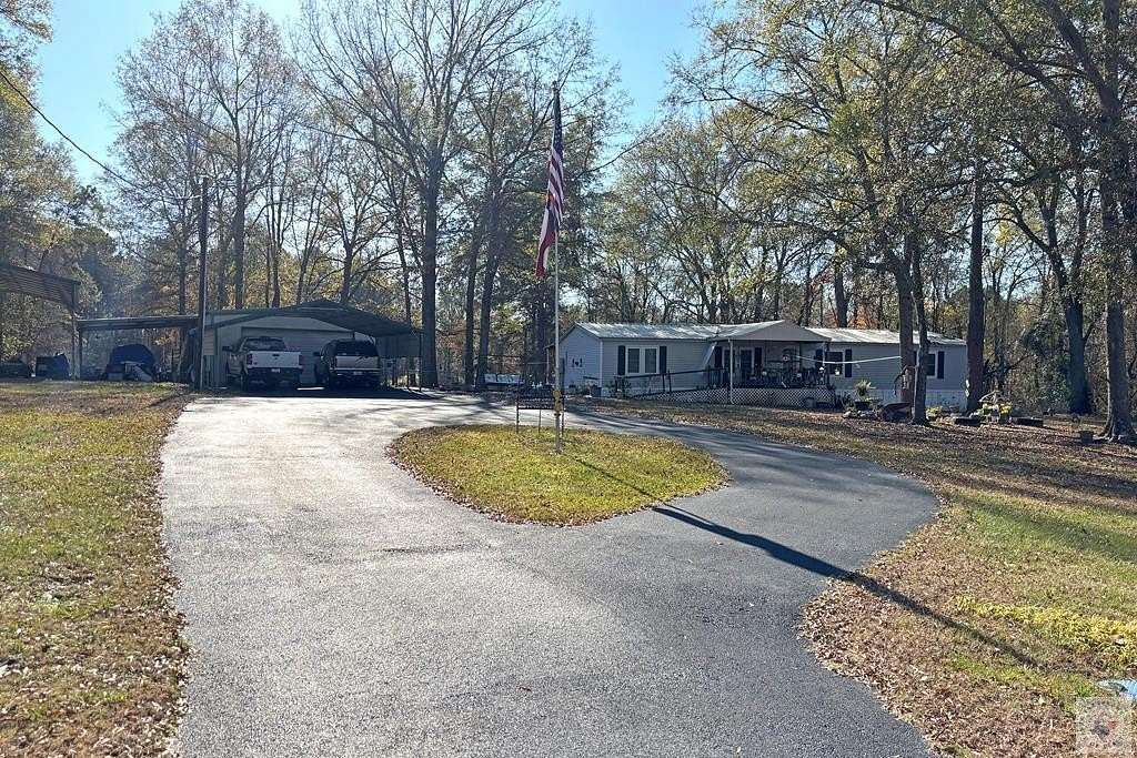 4.76 Acres of Residential Land with Home for Sale in Maud, Texas