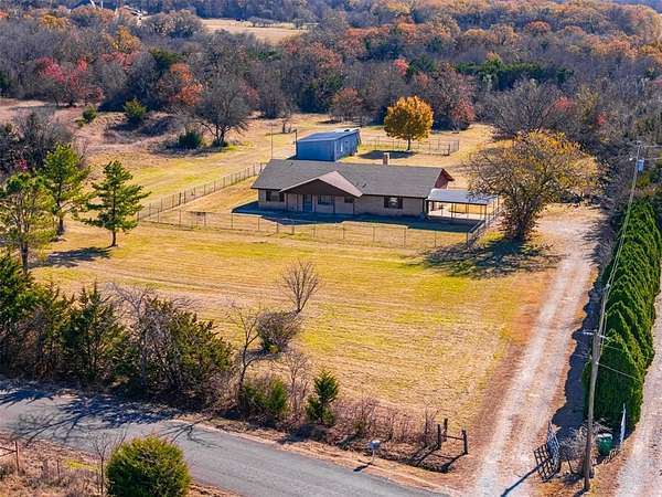 2.59 Acres of Residential Land with Home for Sale in Weatherford, Texas