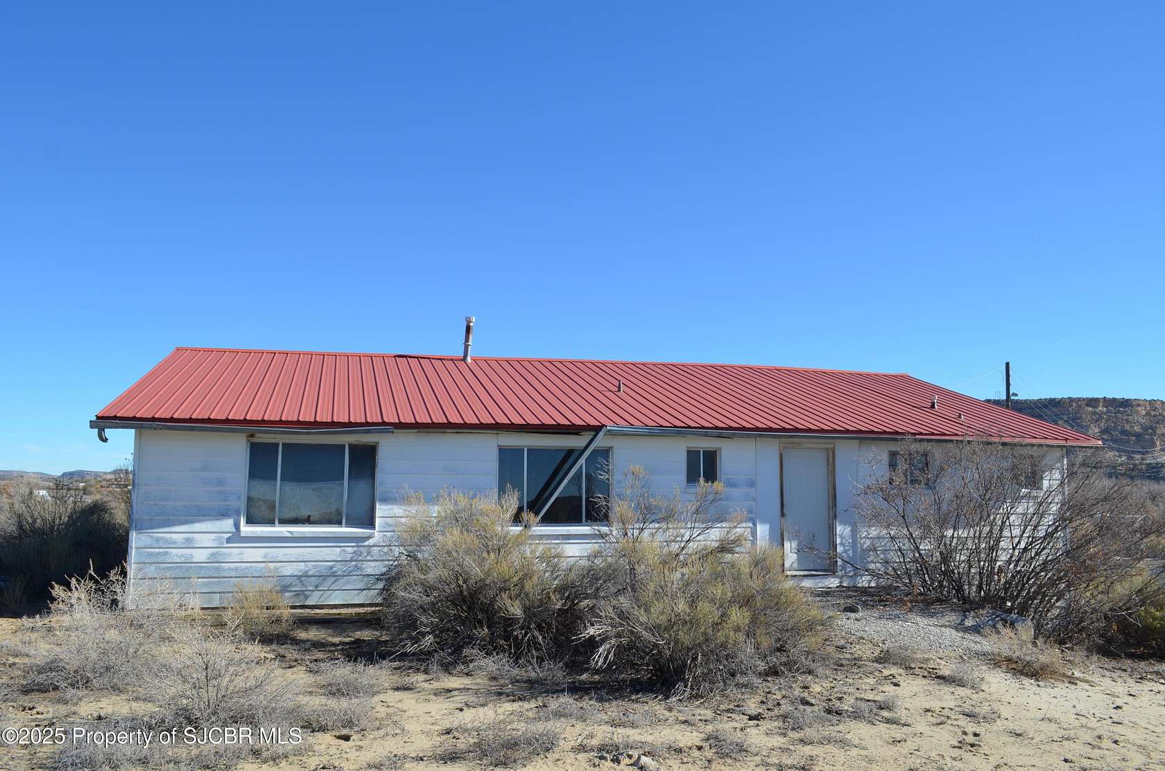 14.5 Acres of Land with Home for Sale in Blanco, New Mexico