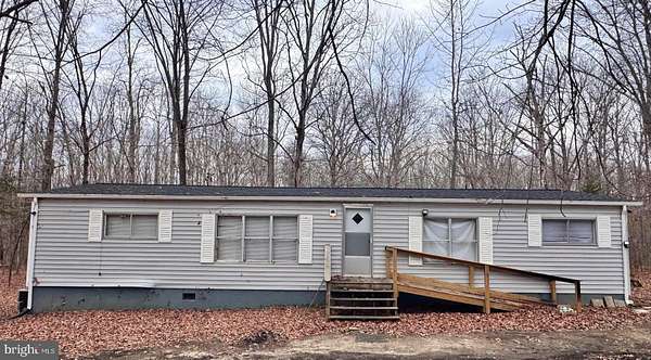 5 Acres of Residential Land with Home for Sale in Bumpass, Virginia