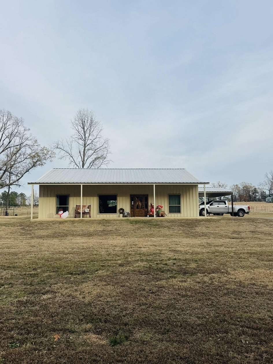 3.4 Acres of Residential Land with Home for Sale in Atlanta, Texas