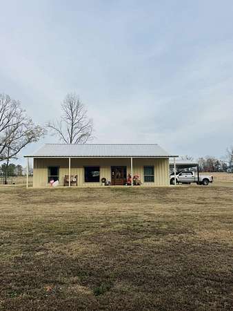 3.4 Acres of Land with Home for Sale in Atlanta, Texas