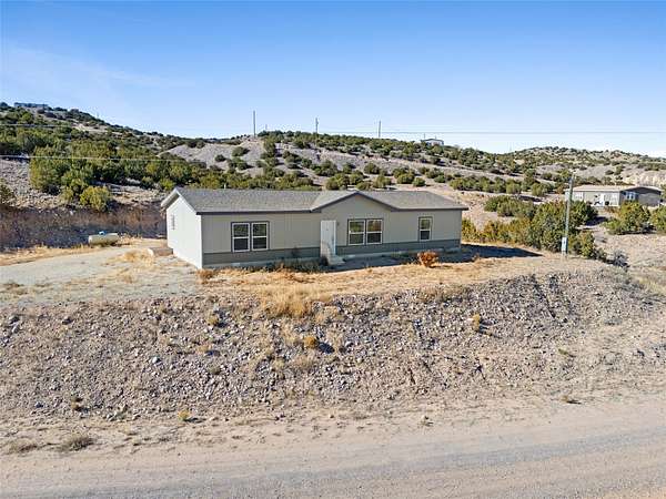 4 Acres of Residential Land with Home for Sale in Hernandez, New Mexico