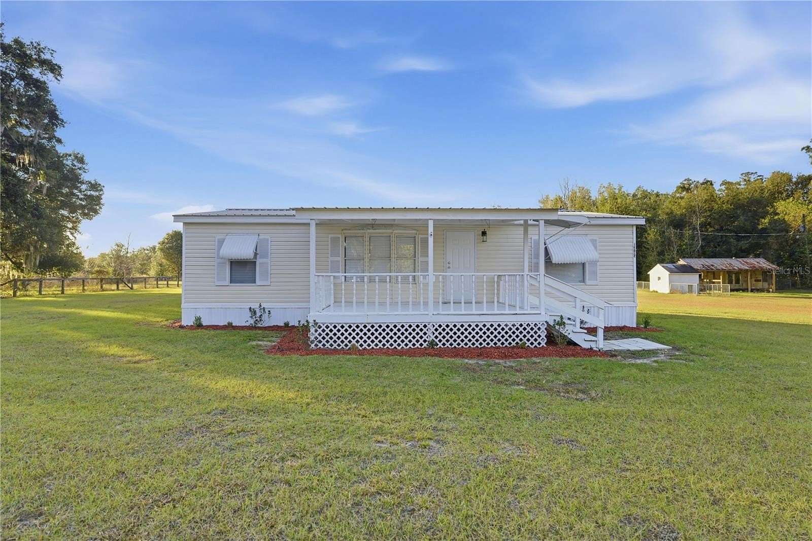 4 Acres of Residential Land with Home for Sale in Citra, Florida