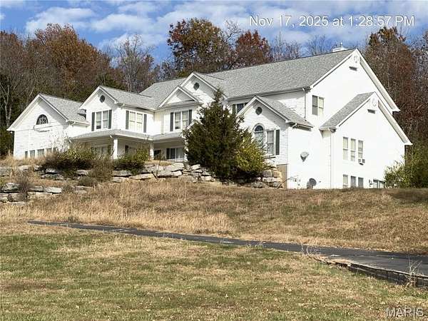 5.88 Acres of Residential Land with Home for Sale in Oakville, Missouri