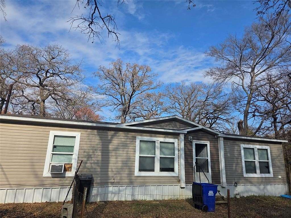 5 Acres of Residential Land with Home for Sale in Gainesville, Texas