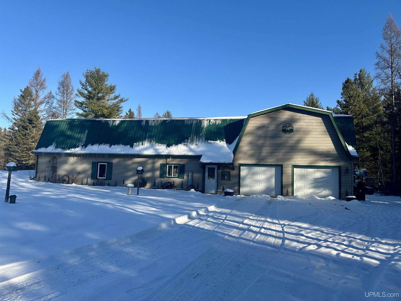 172 Acres of Recreational Land with Home for Sale in Rapid River, Michigan