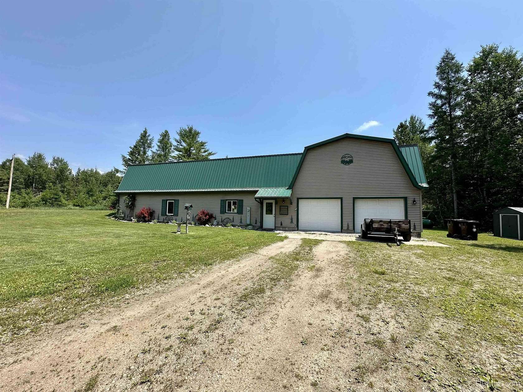172 Acres of Recreational Land with Home for Sale in Rapid River, Michigan