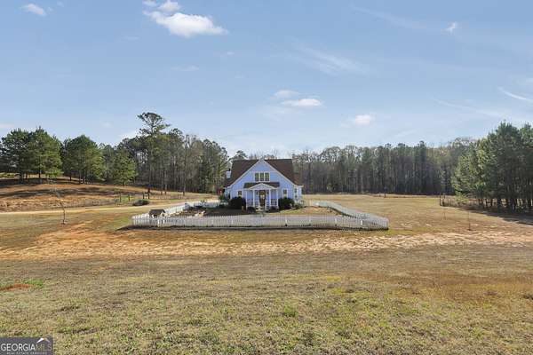 7.76 Acres of Land with Home for Sale in Flovilla, Georgia