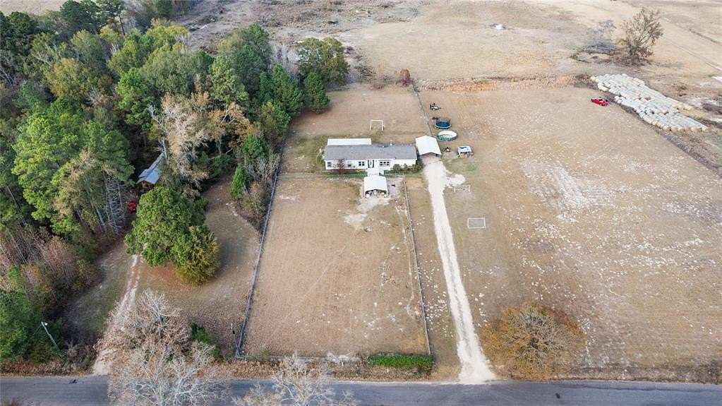 2 Acres of Residential Land with Home for Sale in Gilmer, Texas