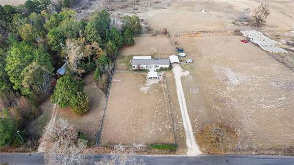 2 Acres of Residential Land with Home for Sale in Gilmer, Texas