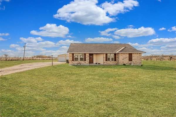 7.28 Acres of Residential Land with Home for Sale in Decatur, Texas