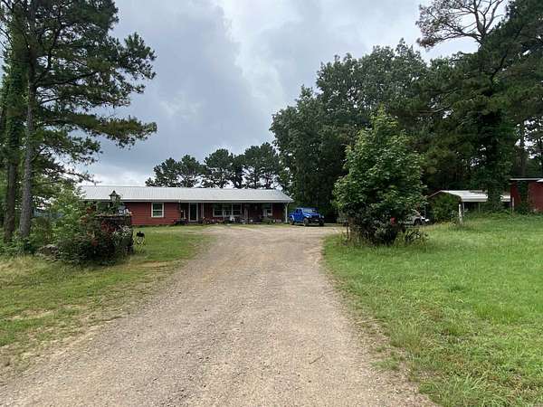 79 Acres of Land with Home for Sale in Clarksville, Arkansas