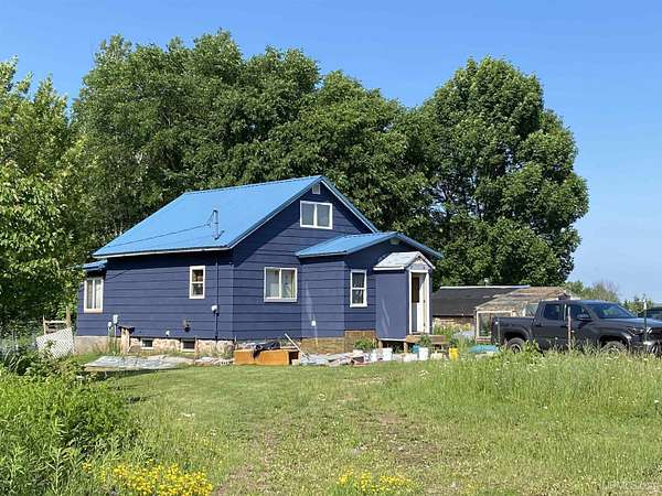 38 Acres of Land with Home for Sale in Mass City, Michigan