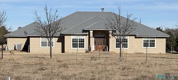 10 Acres of Residential Land with Home for Sale in Texico, New Mexico