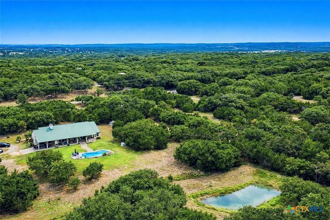 8.57 Acres of Residential Land with Home for Sale in Wimberley, Texas