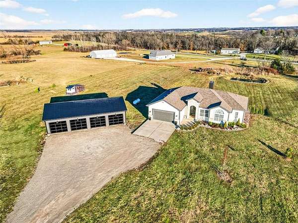 5 Acres of Residential Land with Home for Sale in Lathrop, Missouri