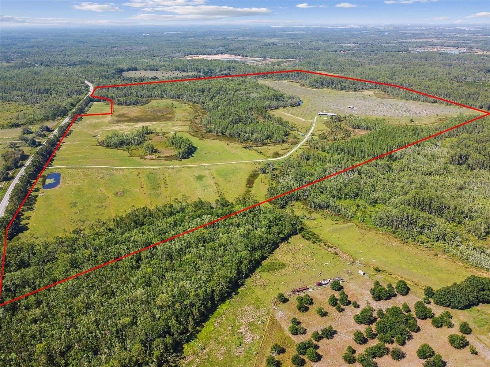 306 Acres of Agricultural Land for Sale in Polk City, Florida