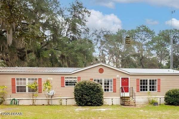 6.44 Acres of Land with Home for Sale in Welaka, Florida