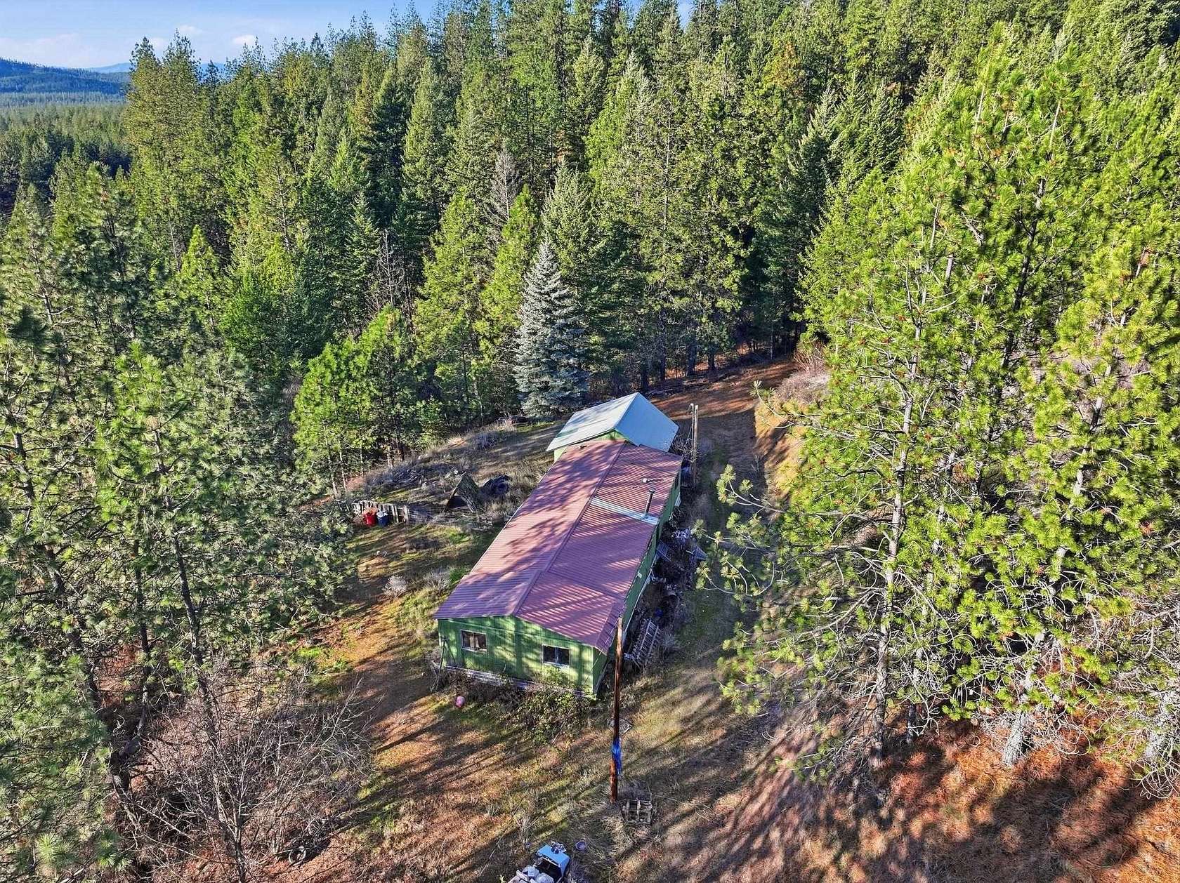 18.6 Acres of Land with Home for Sale in Loon Lake, Washington