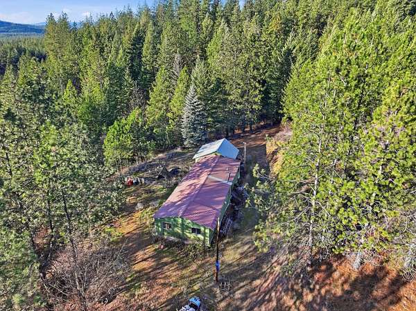18.6 Acres of Land with Home for Sale in Loon Lake, Washington
